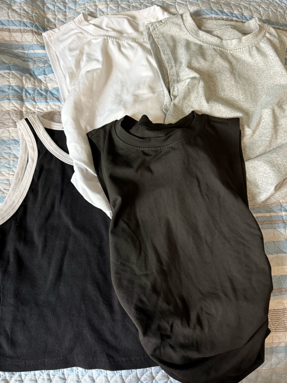 Set of 4 tank top shirts. Gym.